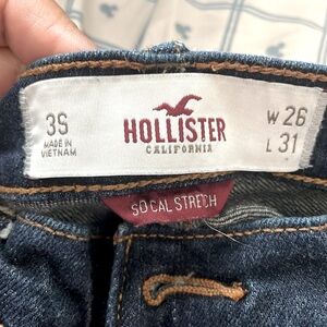 LOW-RISE DARK WASH BOOT JEANS